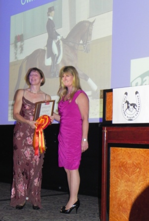 Suzanne accepting Dimaggio's award